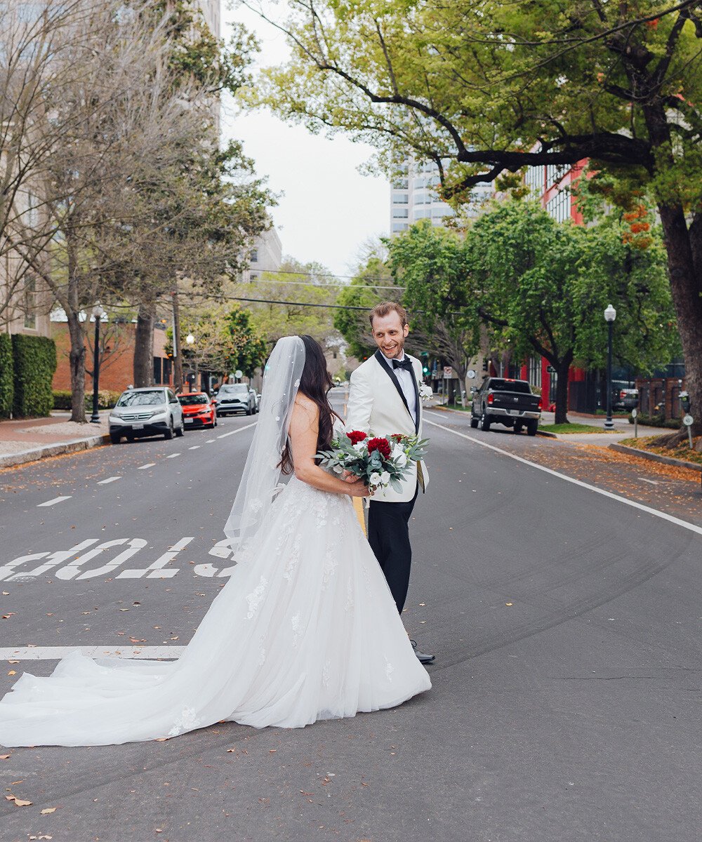 Couple walking through town - Sterling Hotel by Wedgewood Weddings