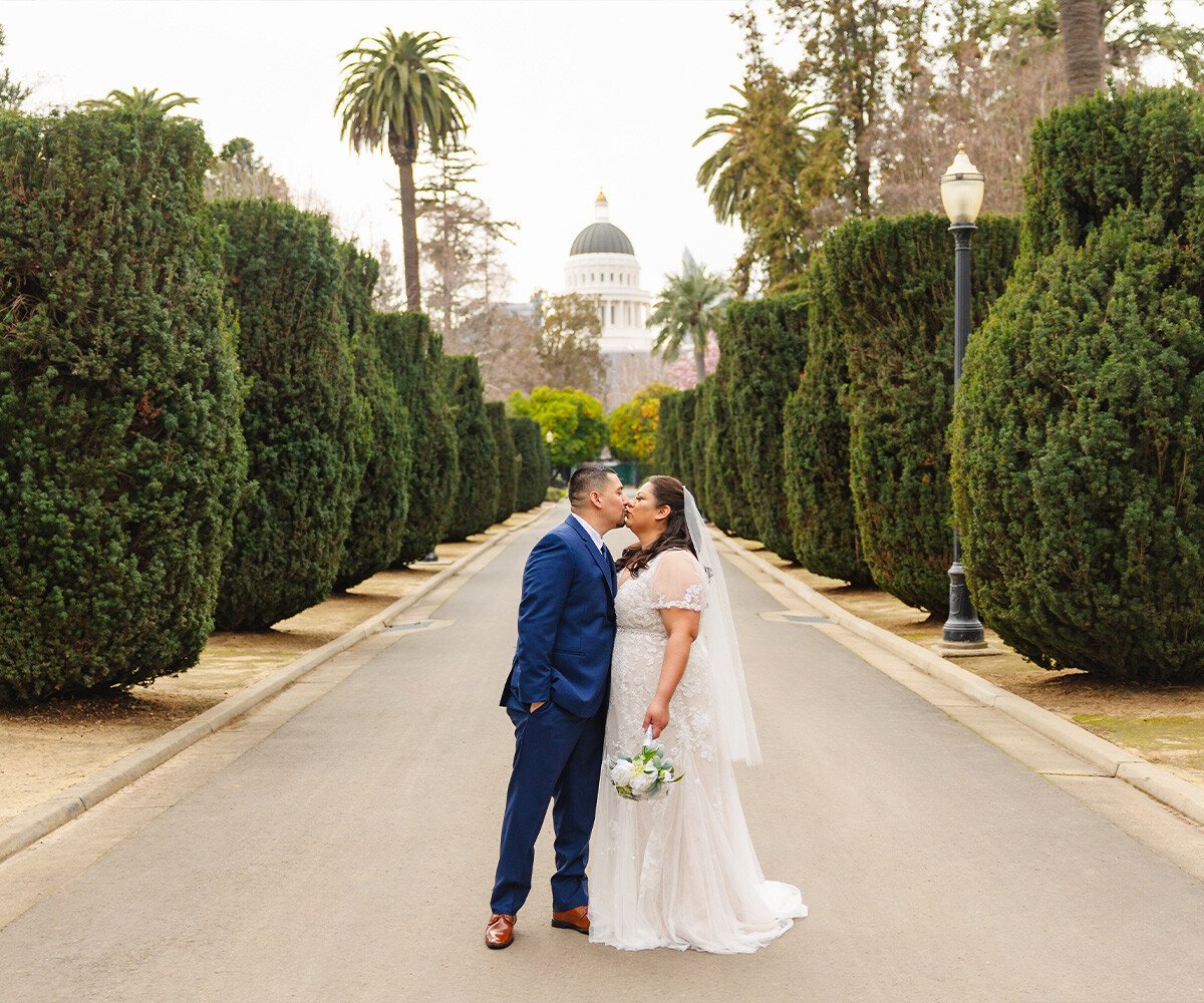 Newlyweds in front of CA State Capitol - Sterling Hotel by Wedgewood Weddings