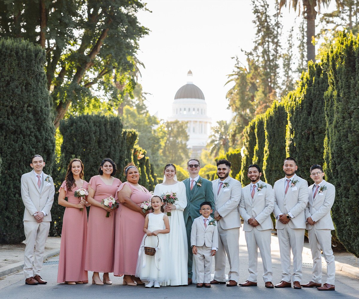 Wedding party in front of state capitol - Sterling Hotel by Wedgewood Weddings