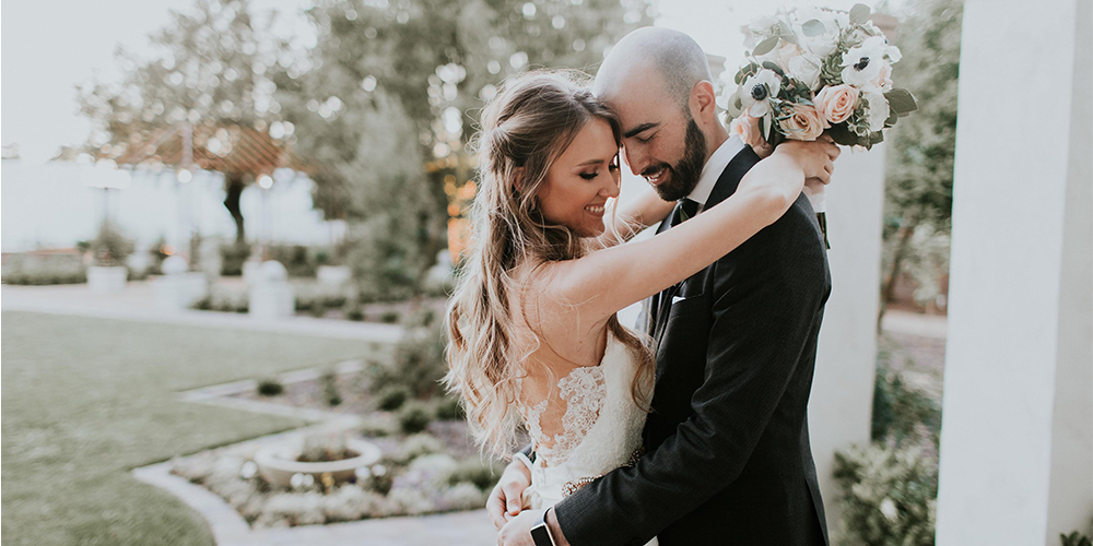 bride and groom outside at Stonebridge Manor