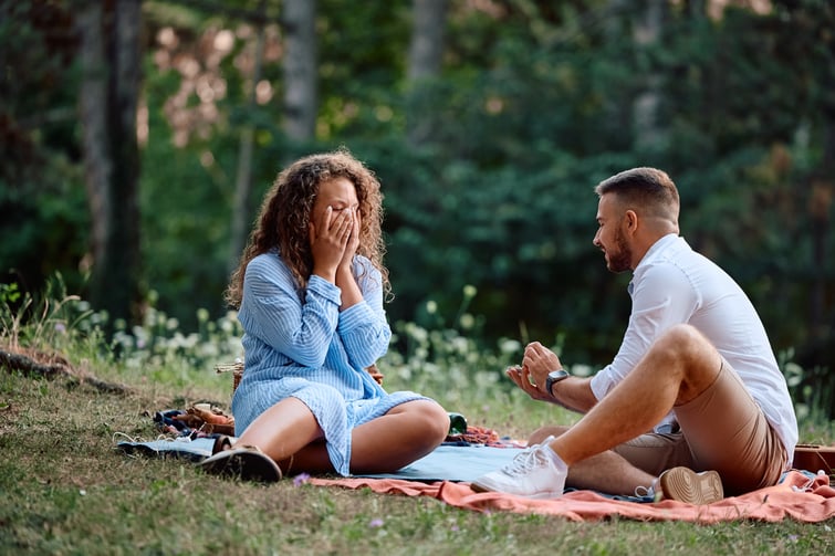 Couple getting engaged in nature