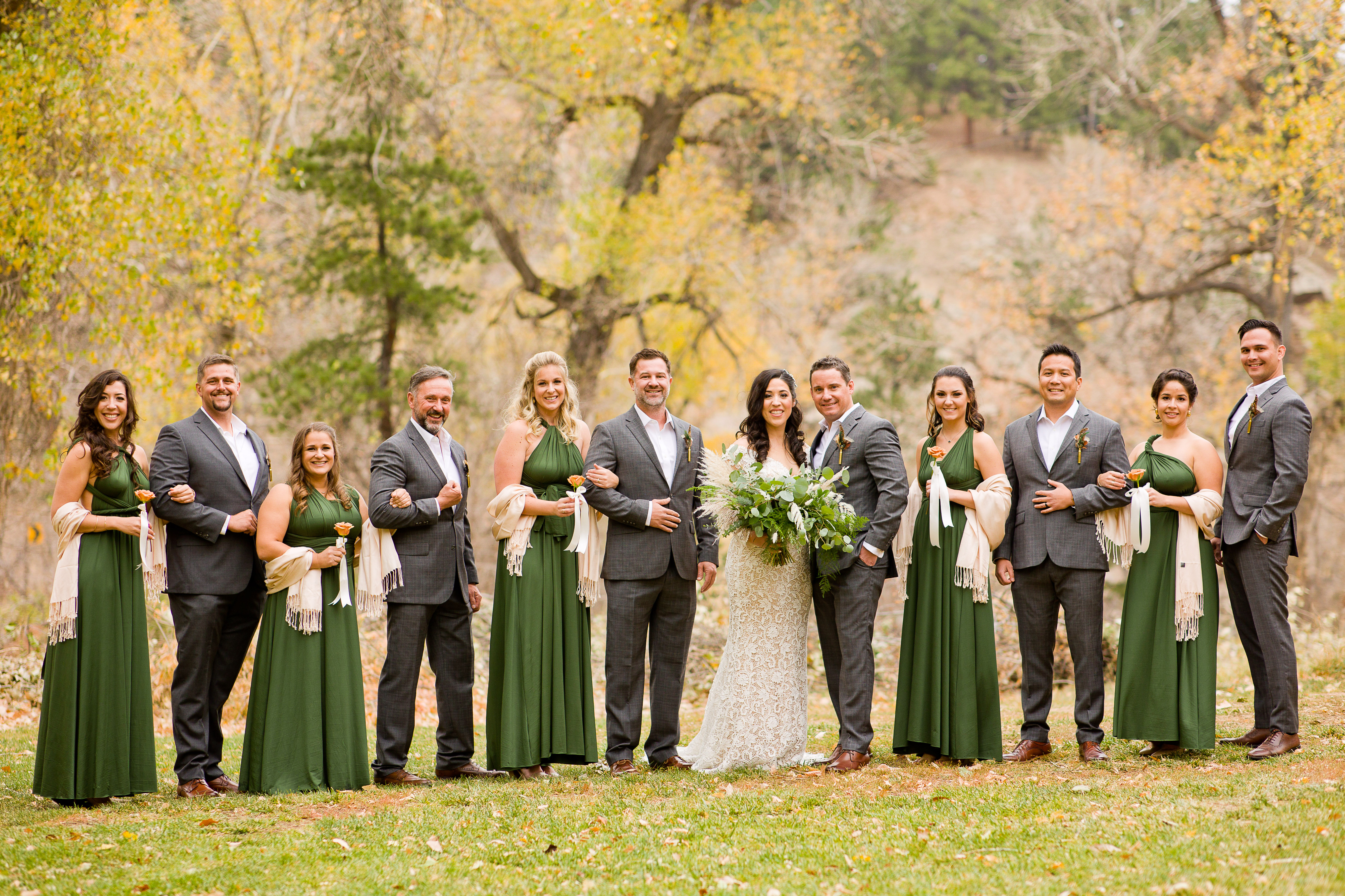 Gorgeous classic bride poses with large bridal party