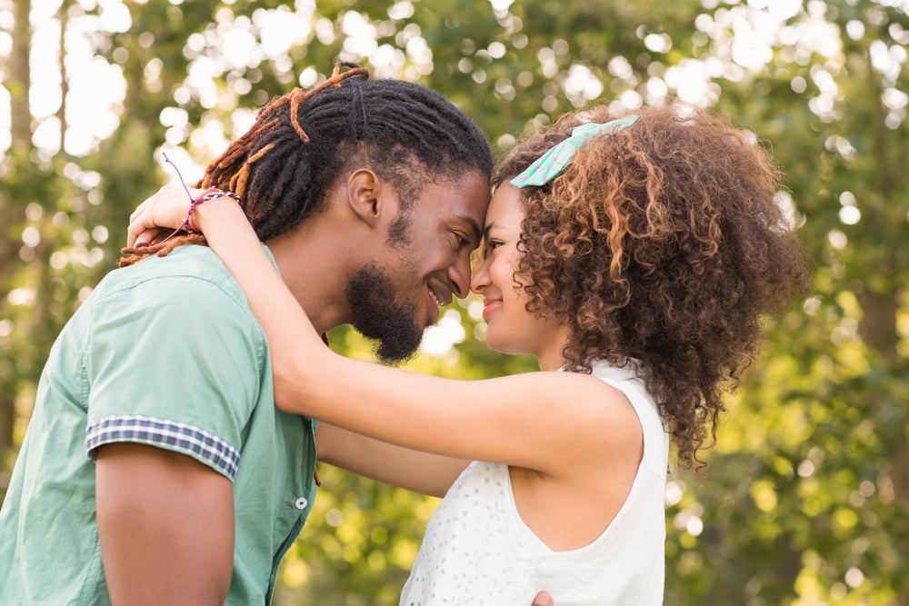 Cute couple in the park on a sunny day