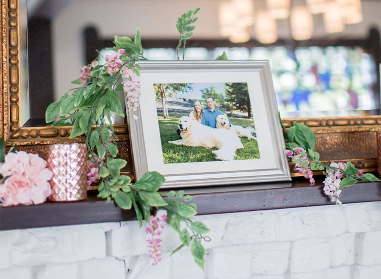 Julie & Vince's family portraits have pride of place on the mantel at Sequoia Mansion, CA