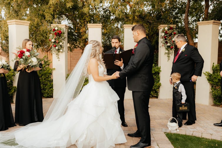 Katie and Shad at columns ceremony site - Stonebridge Manor