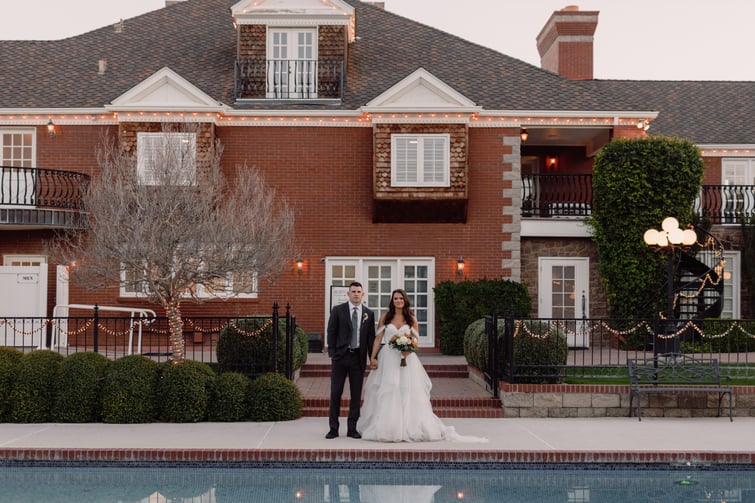 Mitch and Raelyn by the pool at Stonebridge Manor