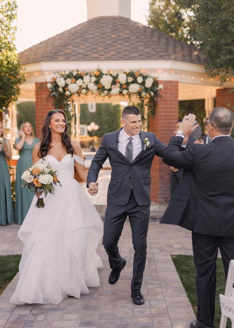 Mitch and Raelyn recessing after the ceremony