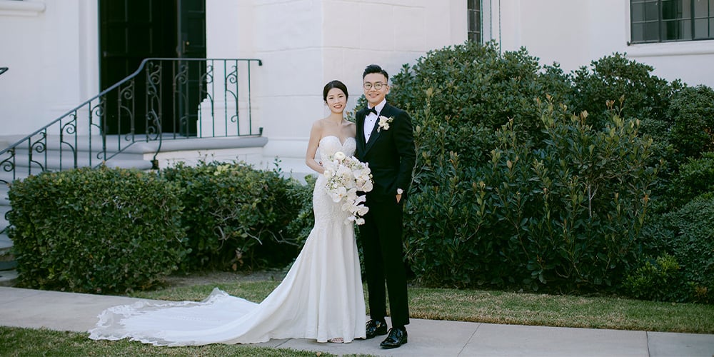 Couple standing in front of Filmore Chapel