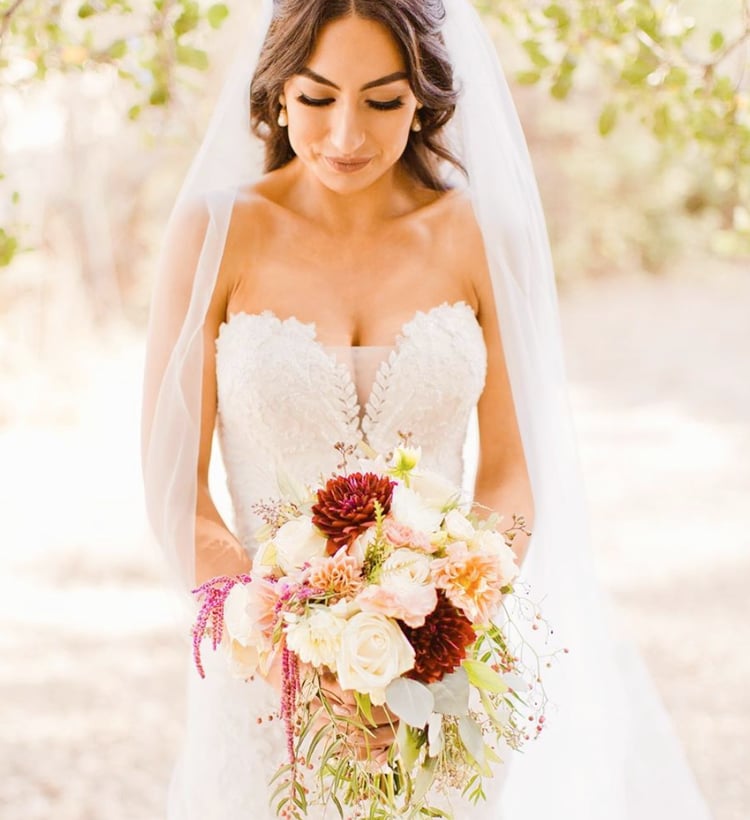 Stunning Bride With Cascading Garden Style Wedding Bouquet