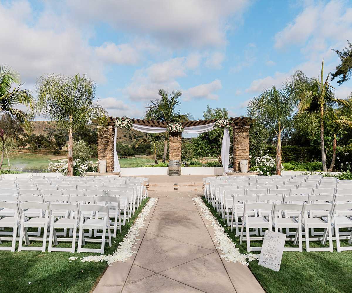 Outdoor lakeside ceremony at Fallbrook Estate by Wedgewood Weddings