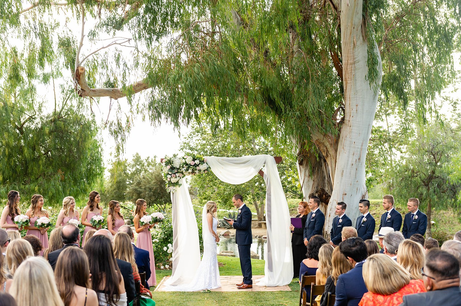 personalized vows at outdoor wedding ceremony