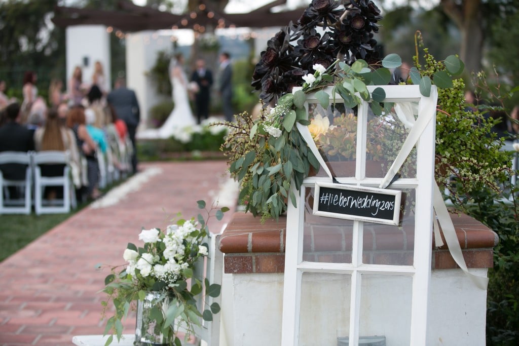 Wedgewood Weddings hashtag sign at ceremony