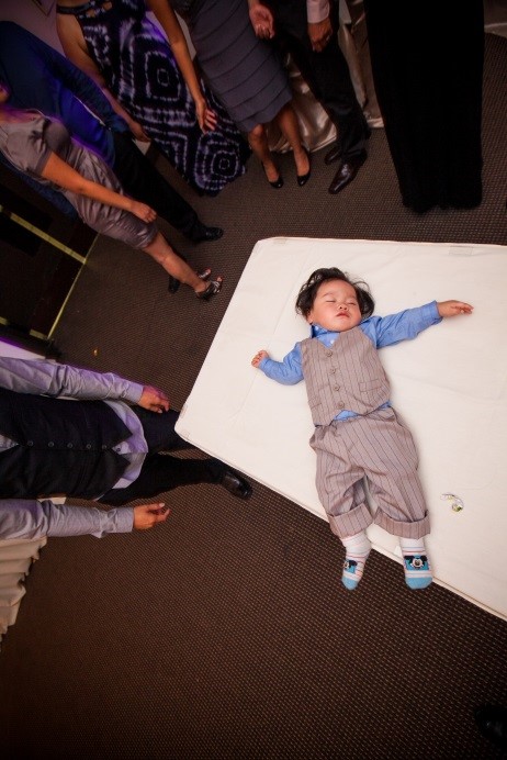 young boy asleep after dancing