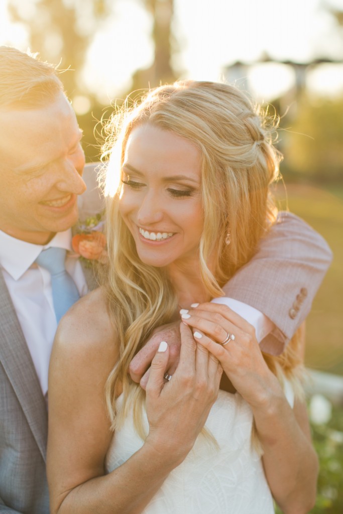 beautiful bride and groom smiling together